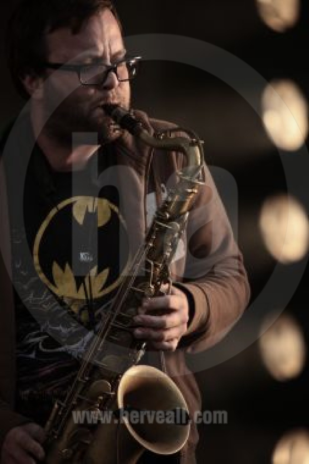 David Andrew Sitek plays saxophone